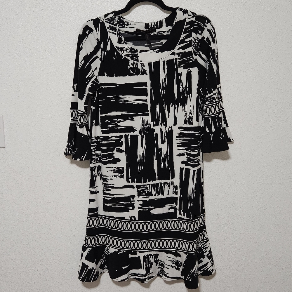 BCBGMAXAZRIA ruffle sleeve/bottom. of dress size small
